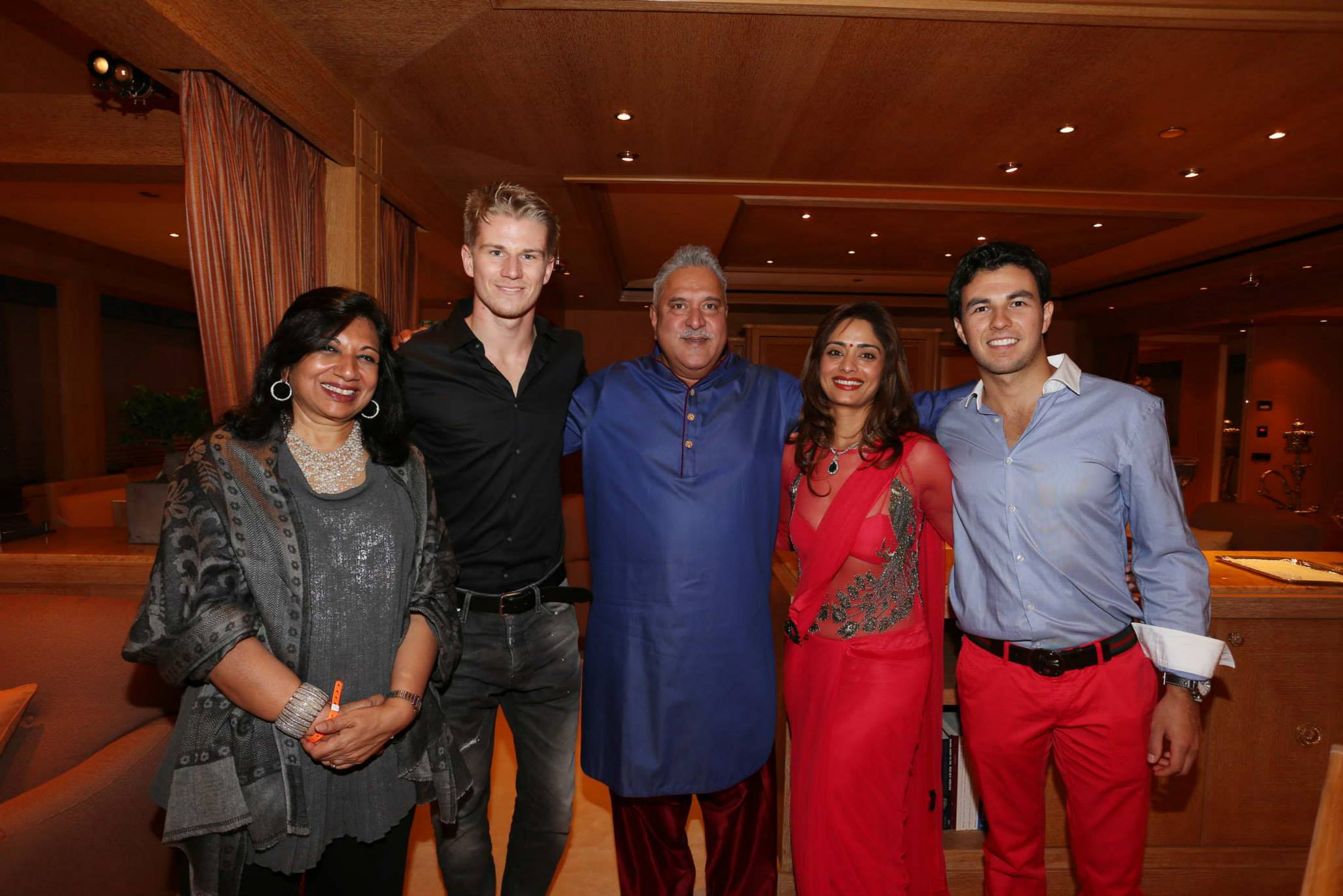 (L to R) Nico Hulkenberg (GER) Sahara Force India F1 with Dr. Vijay Mallya (IND) Sahara Force India F1 Team Owner and Sergio Perez (MEX) Sahara Forc